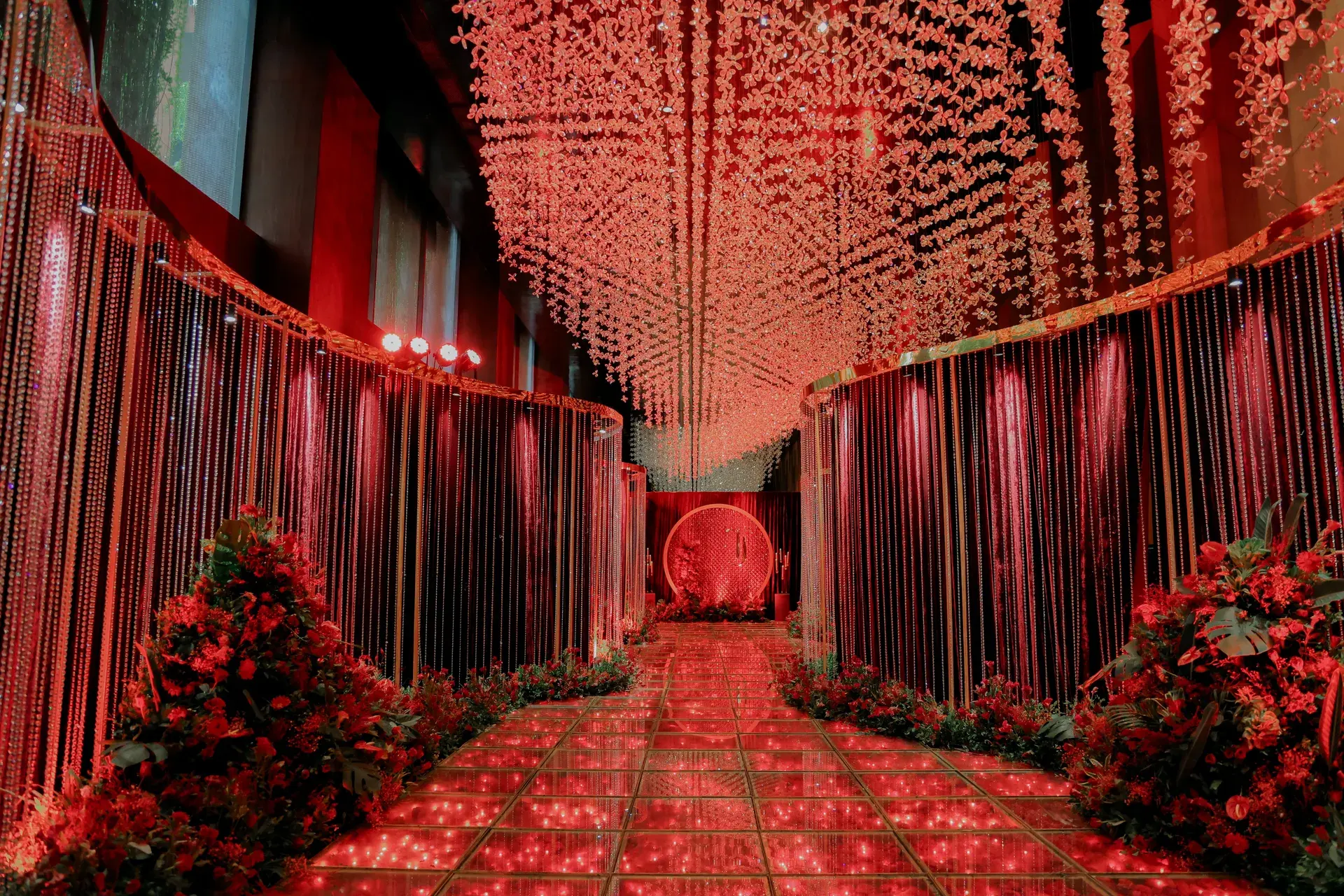 Red-lit floral walkway