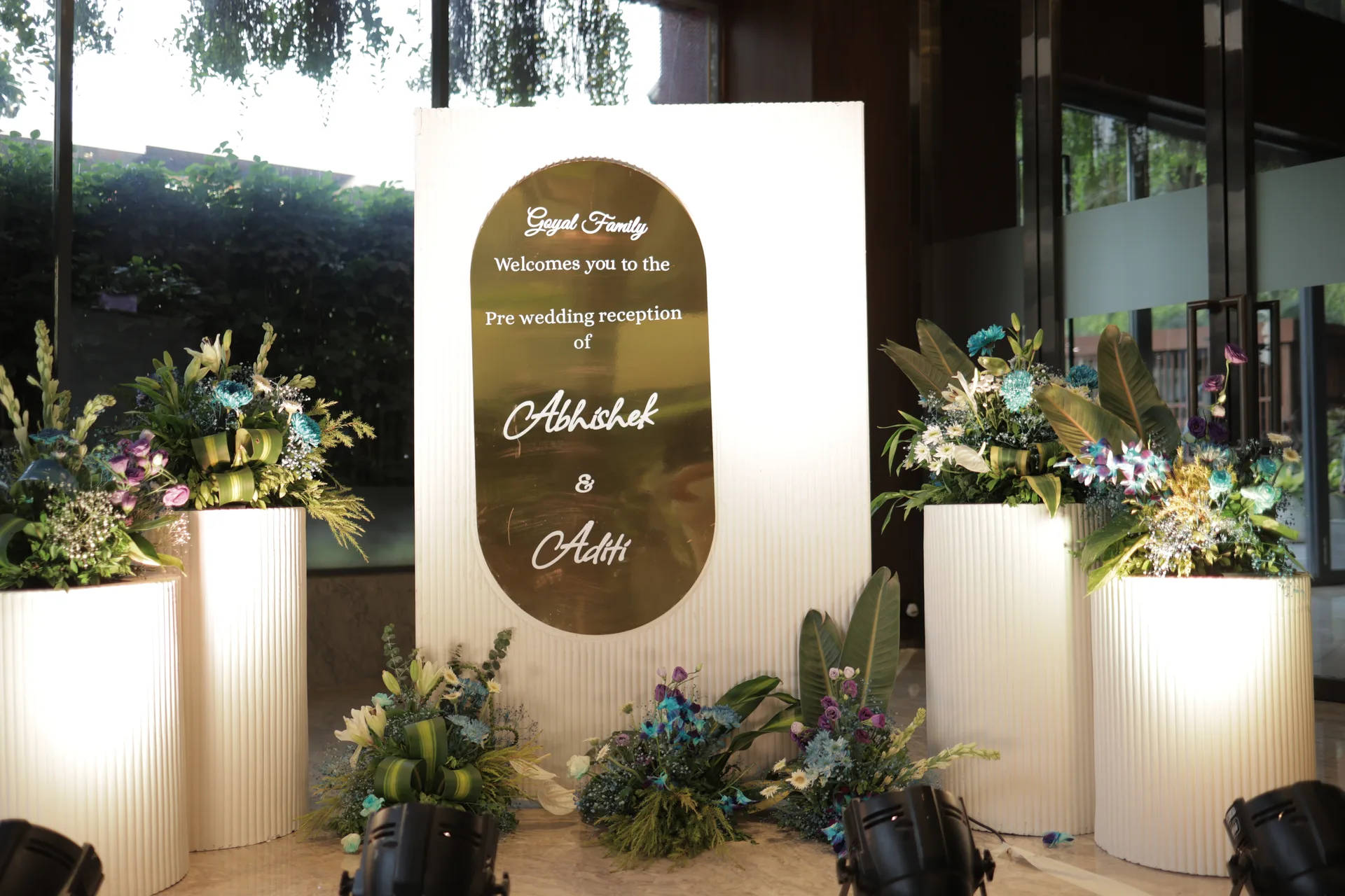 Welcome sign with florals at a reception
